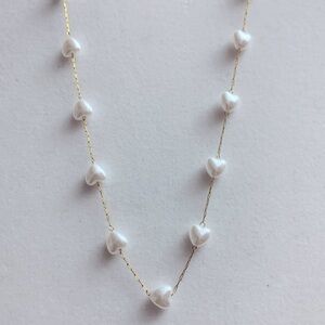 Golden Necklace with Heart-Shaped Beads: